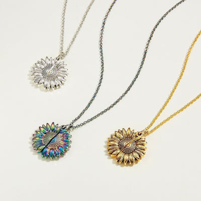 Silver sunflower pendant