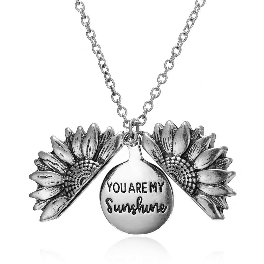 Silver sunflower pendant
