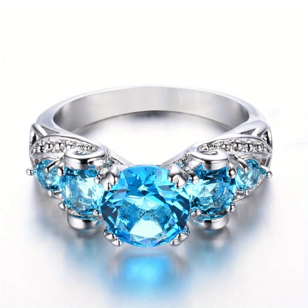 Blue oval crystal silver ring