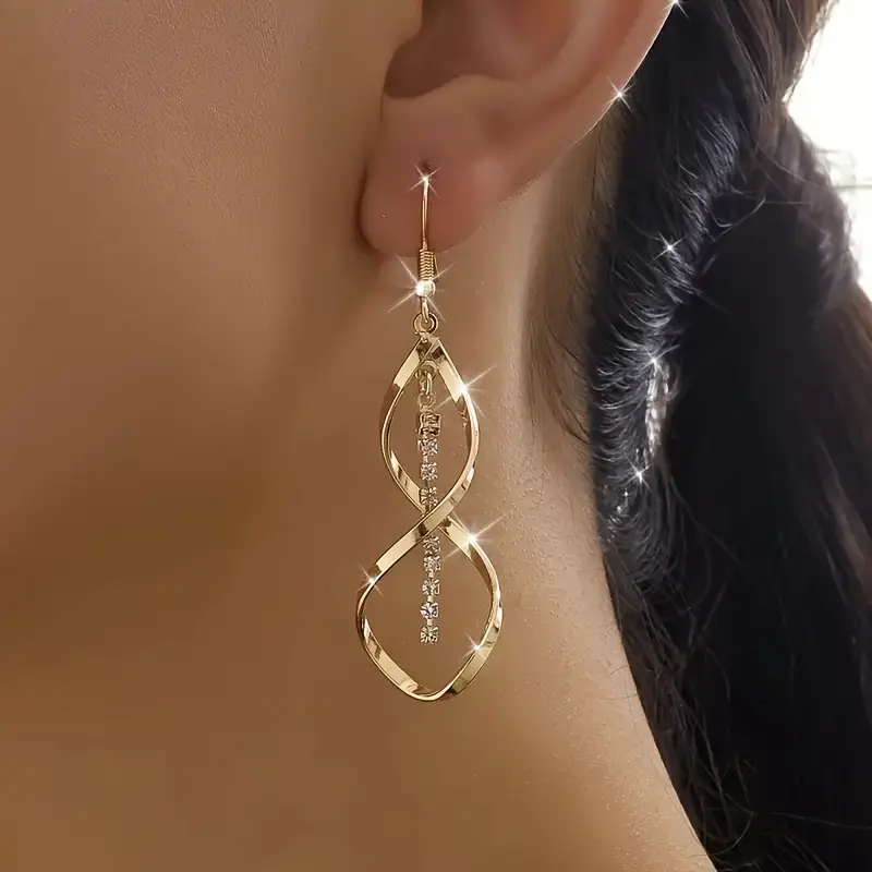 Dangling spiral gold earrings "Cocktail Hour" – Elegant & refined