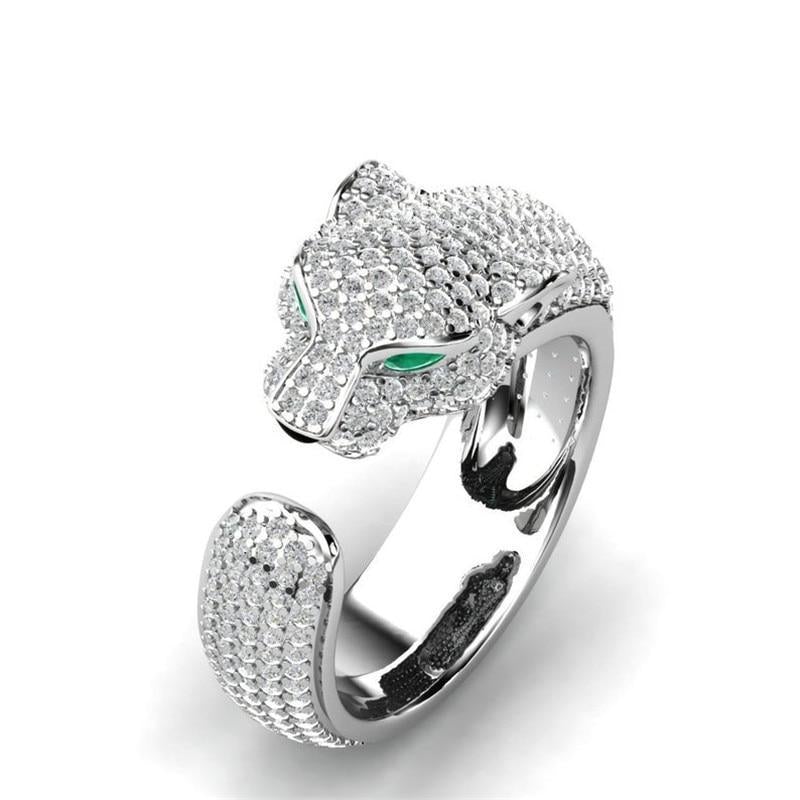 Adjustable jaguar ring in 18K silver and rose gold with green zirconia eyes – Timeless & chic