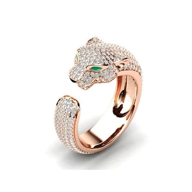 Adjustable jaguar ring in 18K silver and rose gold with green zirconia eyes – Timeless & chic
