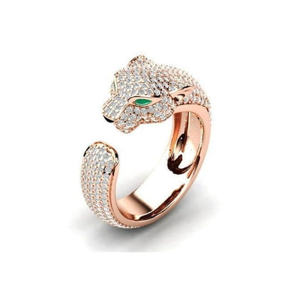 Adjustable jaguar ring in 18K silver and rose gold with green zirconia eyes – Timeless & chic
